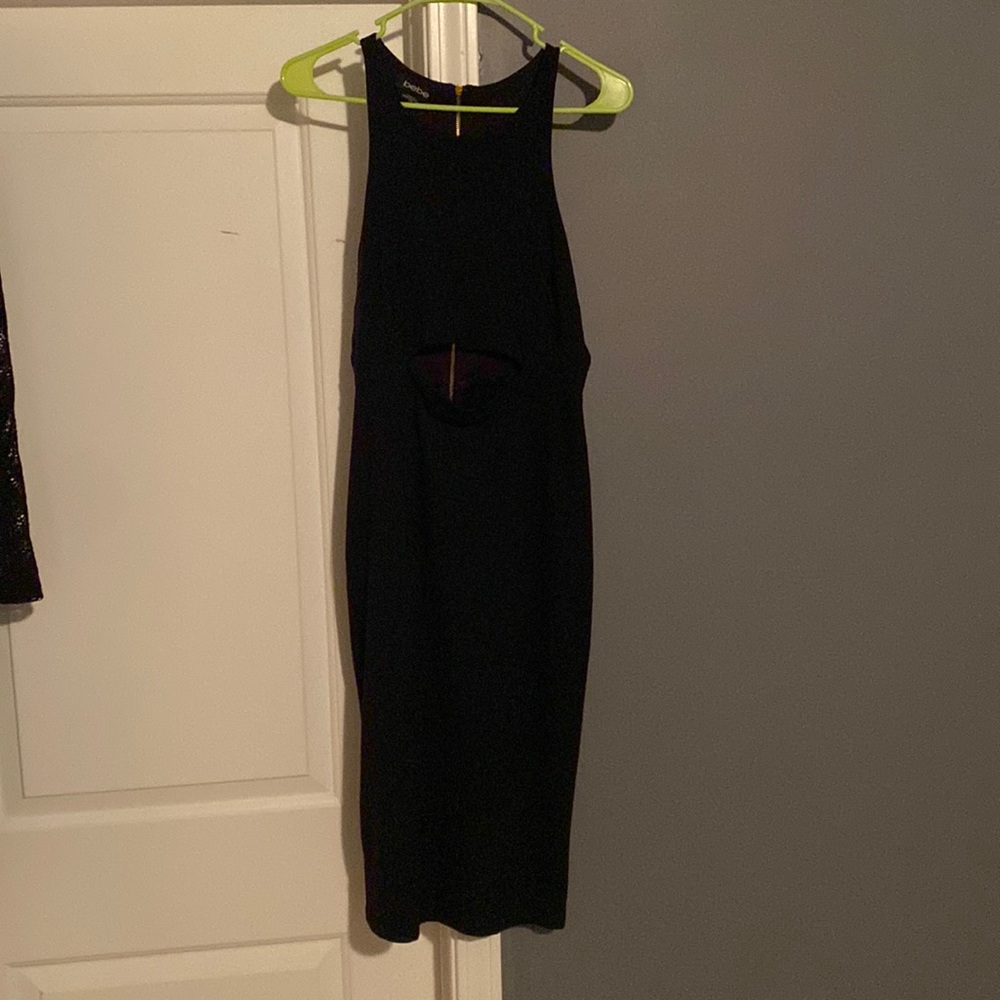 Black Bebe Dress with keyhole opening in the front, Very Sexy!